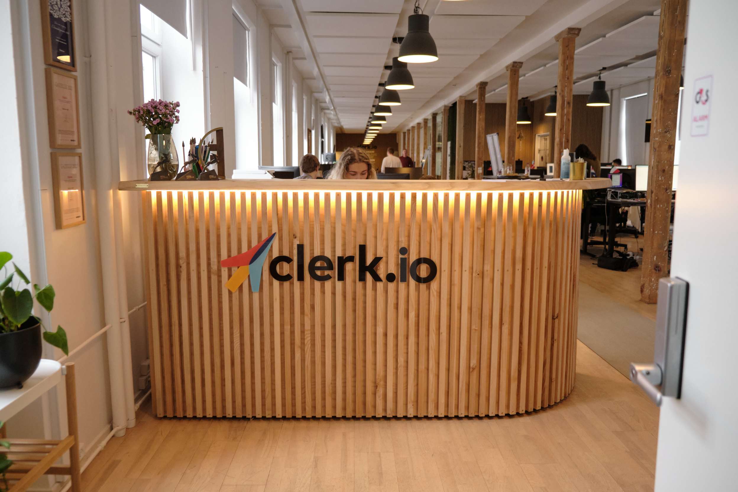 clerk.io reception with wooden reception desk